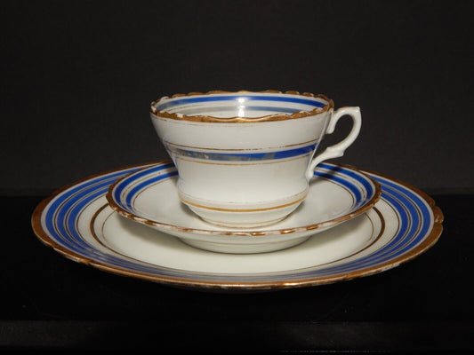 ANTICO TRIO TAZZA TE' 2 PIATTI IMPERO PORCELLANA PARIGI DECORO BLU ORO PRIMO 800