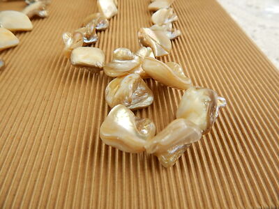 VINTAGE RARA LUNGA COLLANA SCARAMAZZE NATURALI MADREPERLA Circonferenza 125 cm.