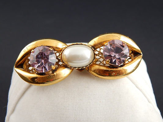 VINTAGE SPILLA CON PREZIOSA DORATURA E CRISTALLI COLOR AMETISTA ANNI '60 BROOCH