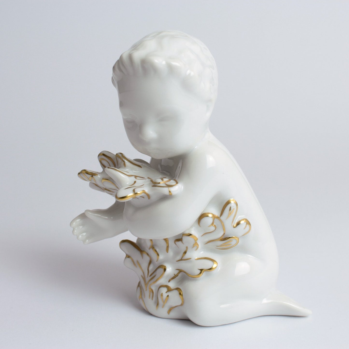 STATUINA PORCELLANA ROYAL COPENHAGEN BING&GRONDAHL "Ragazzo del Mare" CON ORO