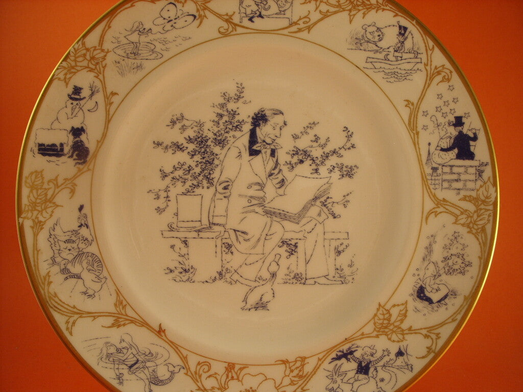 Piatto Bing&Grondahl 1975 con il ritratto di H.C. Andersen al centro, decoro soprasmalto blu e oro zecchino