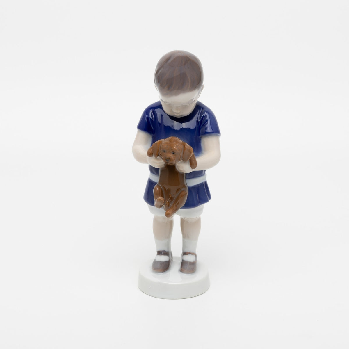 Bing&Grondahl Statuina in "Ole con il Bassotto" Cod 1747 porcellana dipinta a mano, 17 cm
