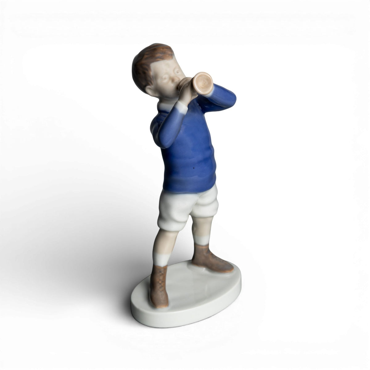 Bing&Grondahl Statuina in "Ragazzo con il Corno" Cod 1792 porcellana dipinta a mano, 18 cm