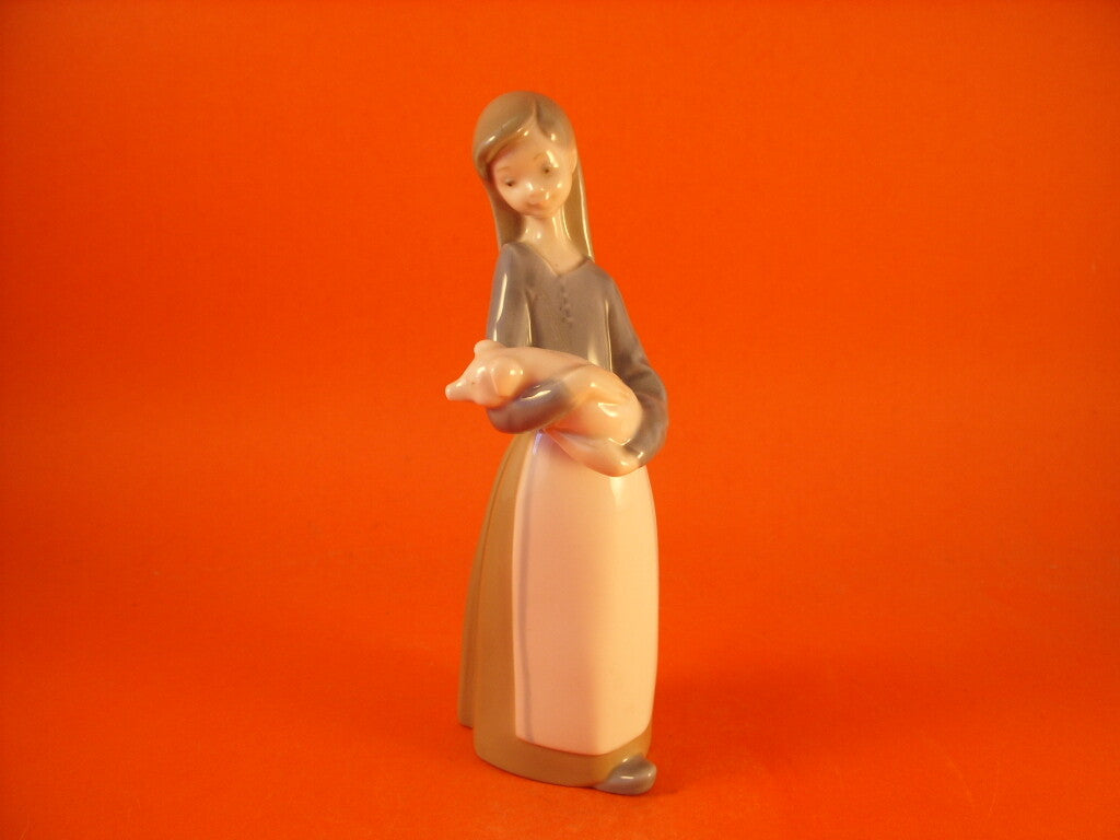 Lladrò Statuina in "Ragazza con Maialino" Cod 1011 porcellana dipinta a mano, 17 cm