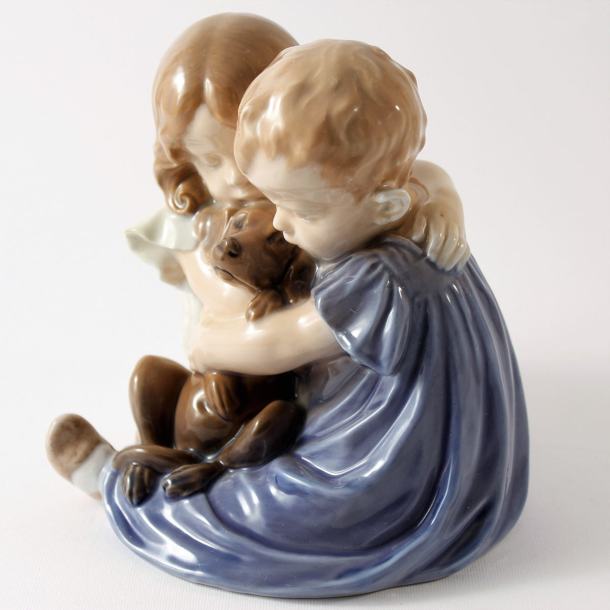 Royal Copenhagen Statuina in "Bambini con Cucciolo" Cod 707 decorazione porcellana da collezione, 15 cm